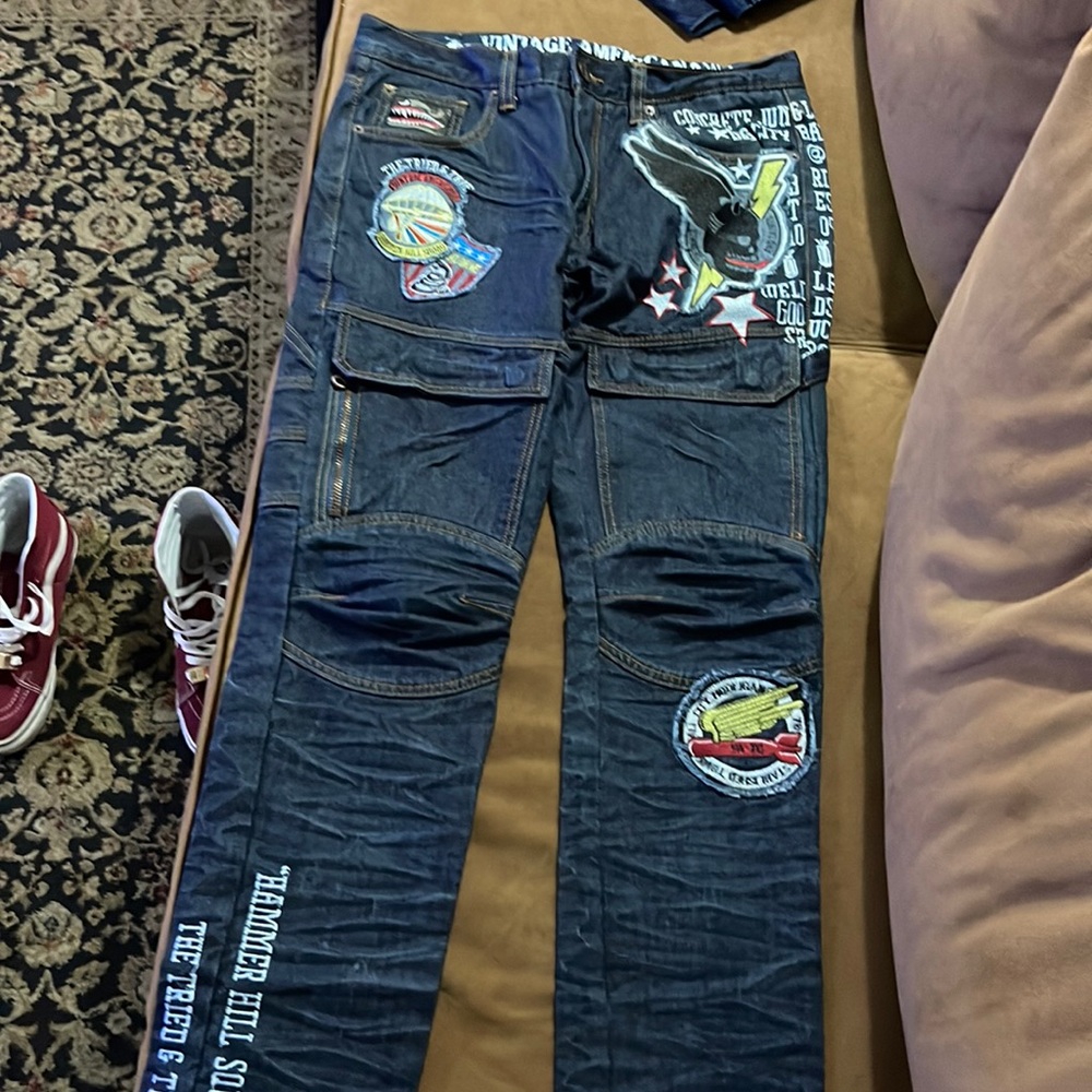 Blue denim wit patches size 34